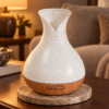 Palma Aroma-Diffuser mit Muscheloptik und Timer in einer warm beleuchteten Wohnszene