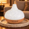 Santorini Aroma-Diffuser mit Muscheloptik und Farbwechsel in einer warm beleuchteten Wohnszene