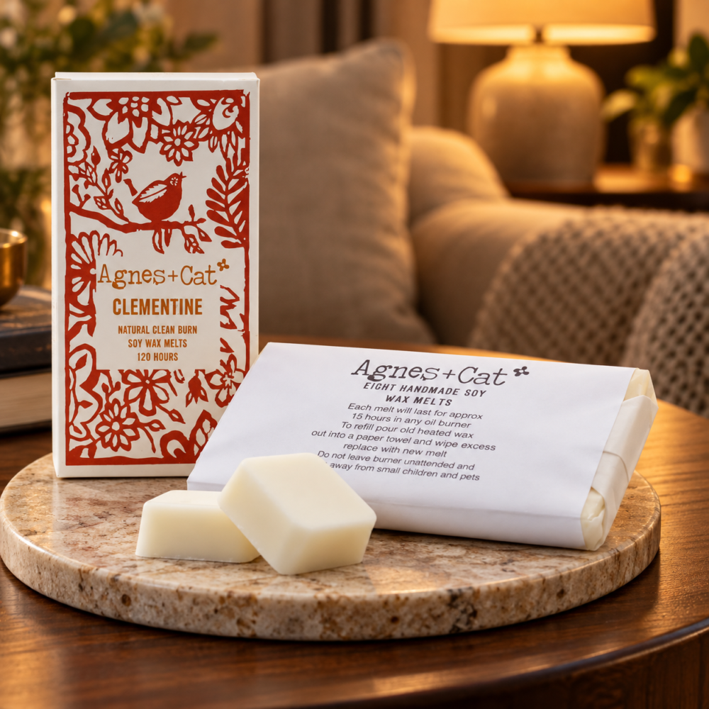 Wax Melts Clementine – 8er-Box in einer warm beleuchteten Wohnszene