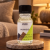 Duftöl Mango – 10 ml in einer warm beleuchteten Wohnszene